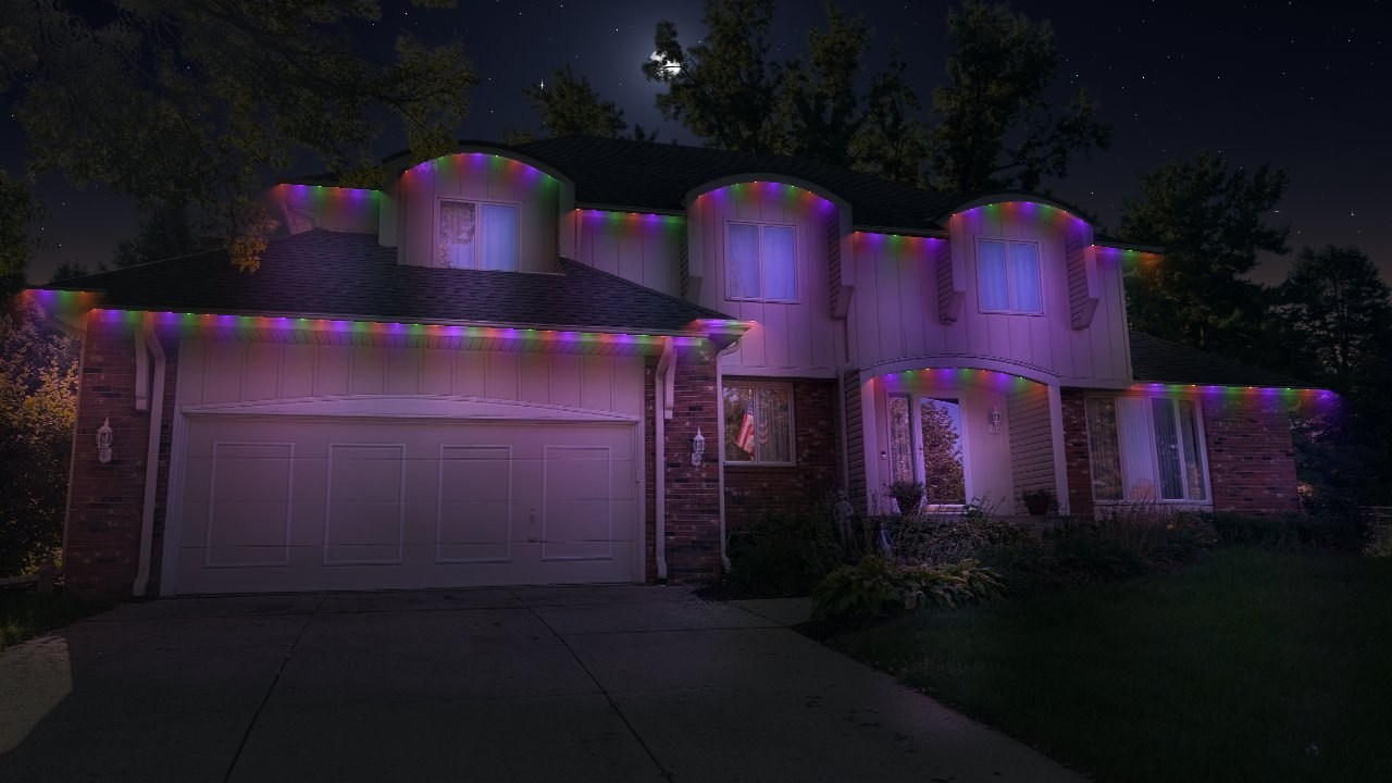 Glow Getter design rendering: year-round lights tucked under the eaves and dormers, shown here in a color-chasing holiday scene.
