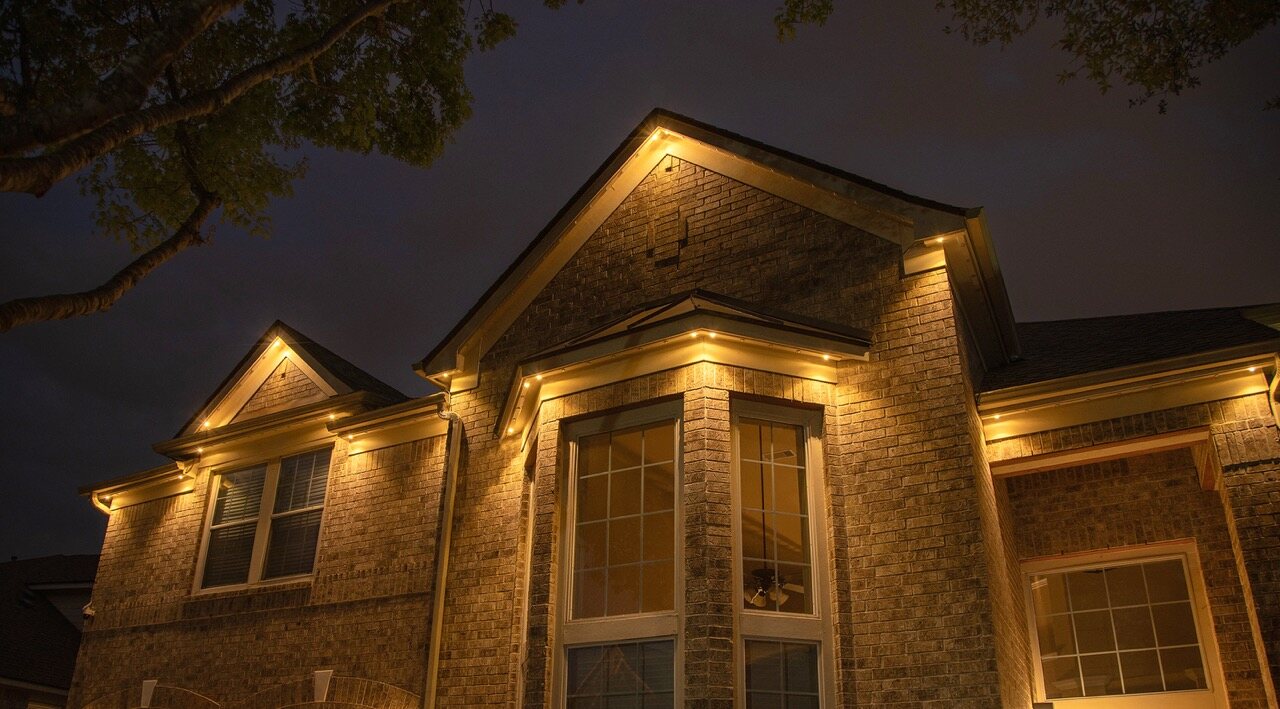 Omaha home glowing with professionally installed holiday lighting booked early in the season