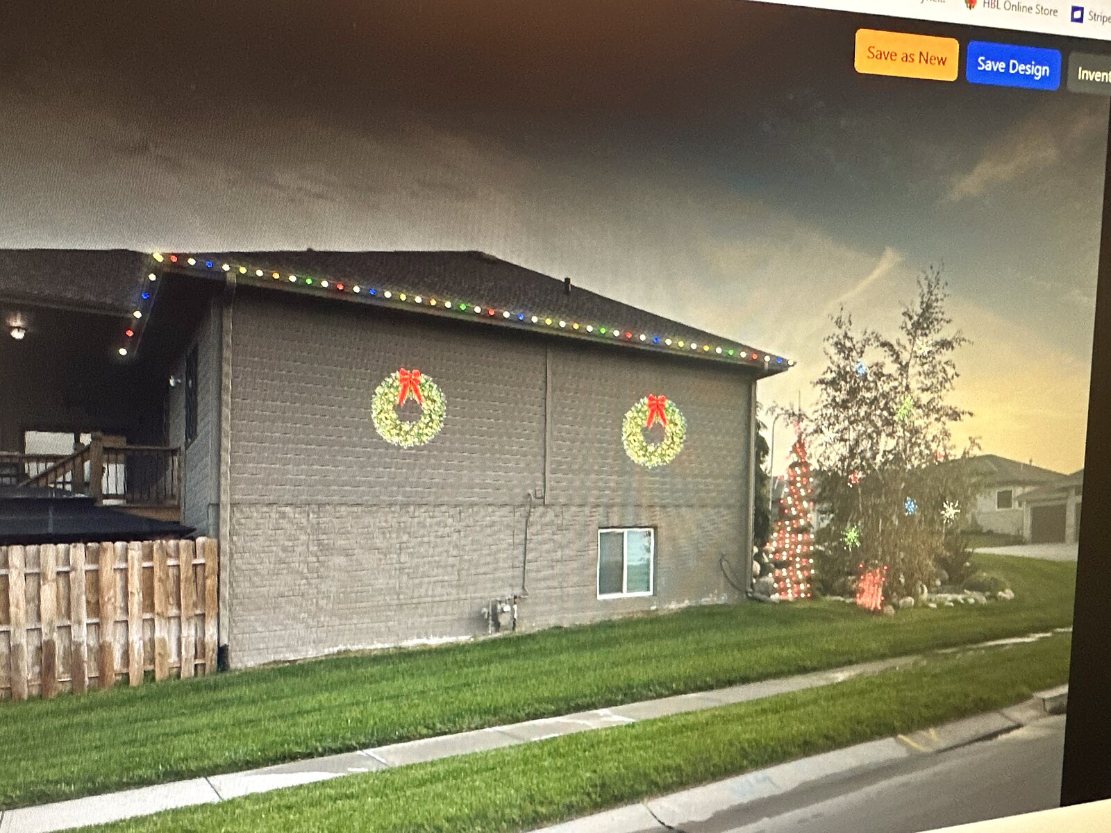 Design rendering showing a lighting plan drawn on a photo of a home before installation